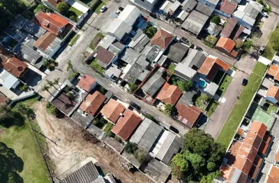 Terreno à venda na Rua Maria Inês Xavier Mendonça, 49, Orleans, Curitiba