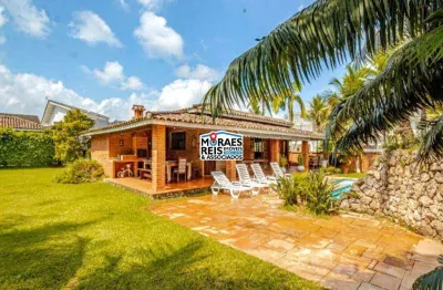 Casa em condomínio fechado com 4 quartos à venda na ezio renato joão mora, 236, jardim acapulco, guarujá por r$ 2.298.000