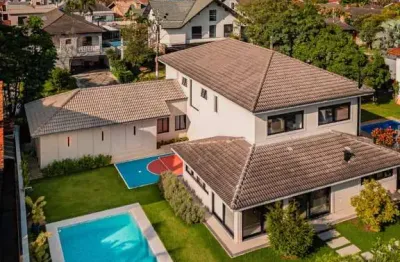 Casa em condomínio fechado com 4 quartos à venda na alameda ribeirão preto, 702, alphaville, santana de parnaíba por r$ 7.300.000