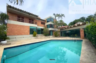 Casa em condomínio fechado com 4 quartos para alugar na alameda guarujá, 782, alphaville, santana de parnaíba por r$ 22.700