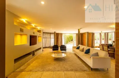 Casa em condomínio fechado com 4 quartos para alugar na alameda morea, 55, alphaville, santana de parnaíba por r$ 50.000