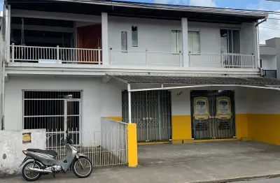 Casa para alguel no bairro cordeiros com um dormitório e uma suíte e duas vagas de garagem