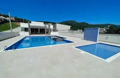 Terreno em condomínio fechado à venda em fundos, biguaçu  por r$ 170.000