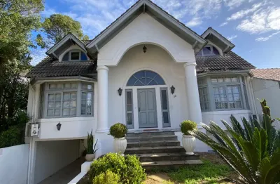 Casa em condomínio fechado com 5 quartos à venda na Rua Pitangueiras, 50, Cantegril, Viamão