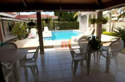 Casa com 5 dormitórios à venda, 700 m² por R$ 3.500.000,00 - Bougainvillee I - Peruíbe/SP