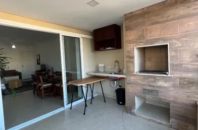 Apartamento venda em ubatuba na praia do itaguá com sacada gourmet e muito amplo 2 suítes 2 garagens piscina