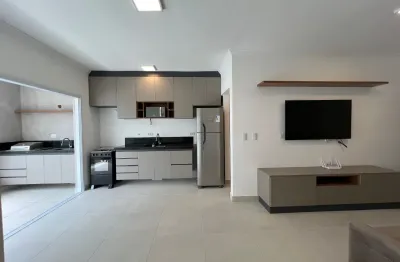 Apartamento em ubatuba a venda com 2 quartos com móveis novos e sacada gourmet na praia do itaguá