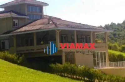 Casa com 7 dormitórios, 460 m² - venda por R$ 2.190.000 ou aluguel por R$ 9.000,00/mês - Zona Rural - Paraibuna/SP