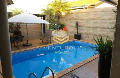 Residência luxuosa: 4 suítes, áreas de lazer e escritórios espaçosos
