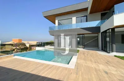 Casa com 5 dormitórios à venda, 600 m² por R$ 6.900.000,00 - Condomínio Reserva do Paratehy - São José dos Campos/SP