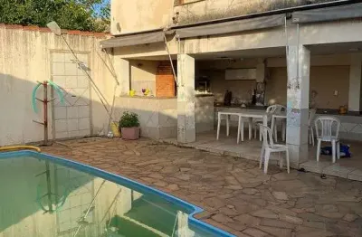 Casa com 3 quartos à venda no osvaldo rezende, uberlândia  por r$ 450.000