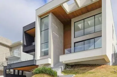 Casa com 4 dormitórios à venda, 437 m² por r$ 4.500.000,00 - condomínio reserva do paratehy - são josé dos campos/sp