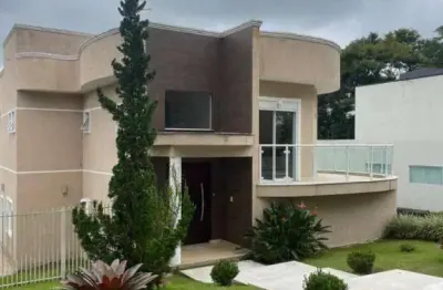 Casa com 4 dormitórios, 270 m² - venda por R$ 1.450.000,00 ou aluguel por R$ 8.000,00/mês - Condomínio Reserva Ibirapitanga - Santa Isabel/SP