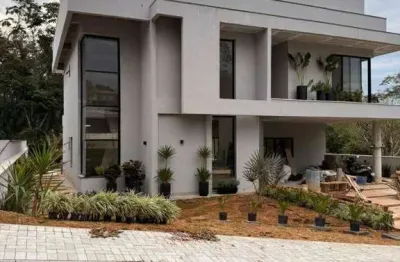 Casa com 4 dormitórios à venda, 361 m² por r$ 2.950.000,00 - condomínio reserva ibirapitanga - santa isabel/sp