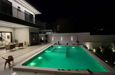 Casa com 5 dormitórios à venda, 387 m² por r$ 2.630.000,00 - condomínio reserva ibirapitanga - santa isabel/sp