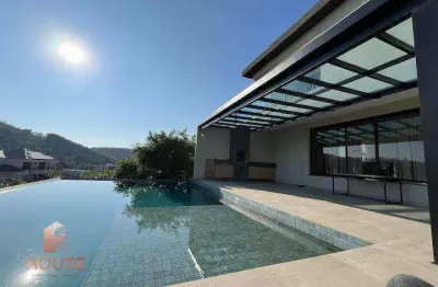 Casa com 4 dormitórios à venda, 603 m² por r$ 4.000.000,00 - condomínio reserva ibirapitanga - santa isabel/sp