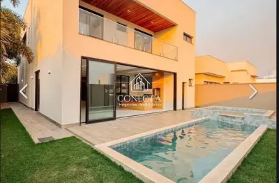Casa exuberante com 4 suítes - condomínio alphaville i