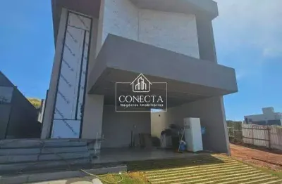 Casa em estilo sobrado, no condomínio terras alpha de alto padrão, 240 m² de construção, 3 suítes, área de lazer com piscina