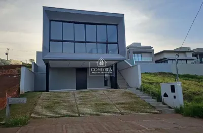Casa estilo sobrado no condomínio terras alpha, com 182 m² construídos em um terreno de 276 m², 3 suites