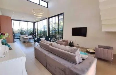 Casa estilo sobrado no condomínio de alto padrão alphaville uberlândia com maravilhoso projeto de arquiteto renomado e construção de qualidade.