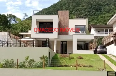 Casa em condomínio fechado com 4 quartos para alugar na rua sabiá, 851, praia da lagoinha, ubatuba por r$ 4.000 por dia