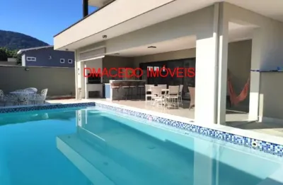 Casa em condomínio fechado com 4 quartos à venda na avenida engenho velho, 1390, praia da lagoinha, ubatuba por r$ 1.750.000