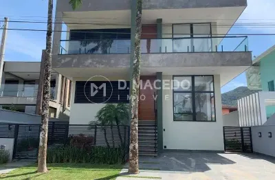 Casa em condomínio fechado com 4 quartos à venda na avenida copacabana, 218, praia da lagoinha, ubatuba, 388 m2 por r$ 4.250.000