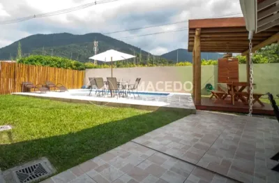 Casa super confortável no condomínio salga na praia da lagoinha, ubatuba-sp: 4 quartos, 3 suítes, com piscina e ar condicionado - imperdível!