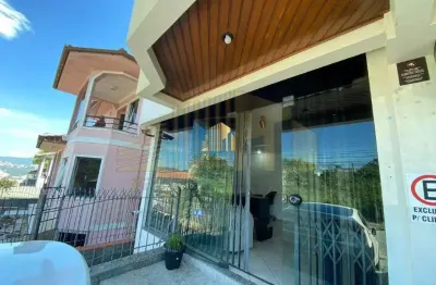 Loja comercial no térreo para venda em praia comprida, são josé/sc