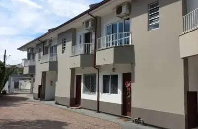 Casa em condomínio fechado com 3 quartos à venda na Rua dos Canários, 155, Cidade Universitária Pedra Branca, Palhoça, 111 m2 por R$ 590.000