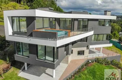 Casa de luxo no condominio alpha ville em gramado-rs.