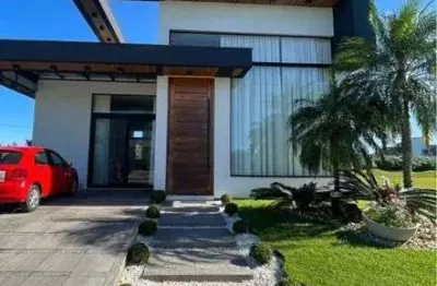 Belissima casa mobiliada a venda no condominio reserva das aguas em torres-rs.