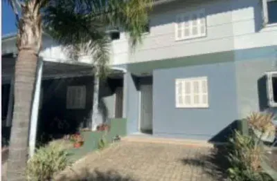 Casa a venda com tres dormitorios no condominio bela vista em torres-rs.