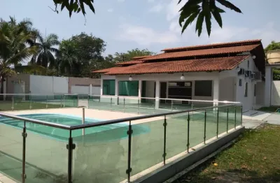 Cond. laranjeiras. casa com 1.600m2 . 3 suites , sala para 2 ambientes + casa de apoio
