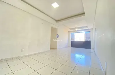 Apartamento no centro de 3 quartos e vaga de garagem semimobiliado