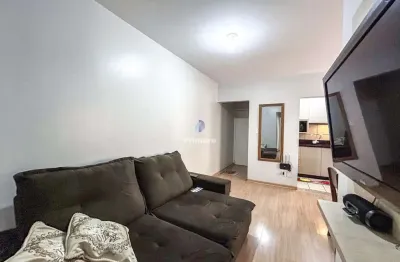 Apartamento de 2 quartos, 1 banheiro, 1 garagem, semimobiliado