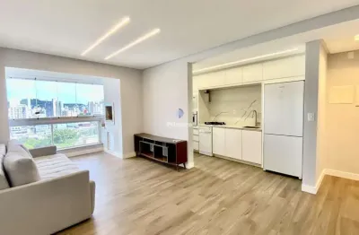 Apartamento centro de criciuma 02 dormitorios suite sala cozinha andar alto