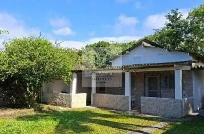 Casa à venda com 04 Dormitórios, 09 Vagas, com Edícula, em Indaiá  -  Bertioga/SP