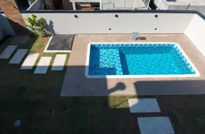 Casa à venda com piscina , espaço gourmet com 241,64 m²  condomínio fechado em a