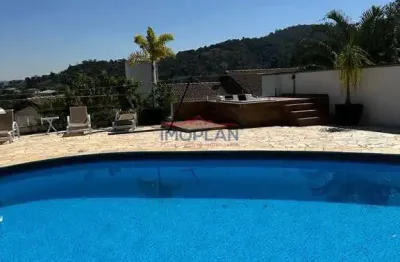 Casa para venda/locação com 4 suítes em condomínio alto padrão
