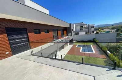 Casa à venda no condomínio figueira garden, em atibaia. amplo imóvel com 4 suite