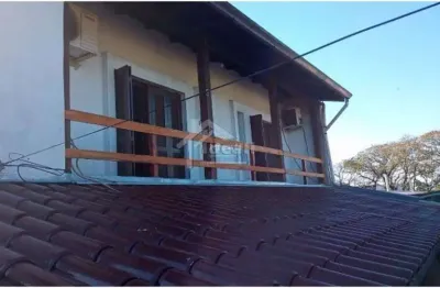 Casa com 3 quartos à venda na campos sales, 37, dihel, sapucaia do sul por r$ 450.000