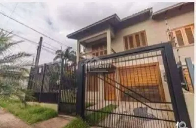 Casa com 3 quartos à venda na rua brasiliêncio rodrigues da silva, 52, nova sapucaia, sapucaia do sul por r$ 480.000