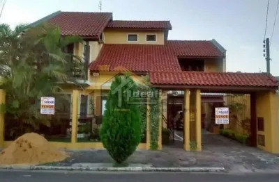 Casa com 4 quartos à venda na rua dulcimar cardoso, 382, paraíso, sapucaia do sul por r$ 650.000
