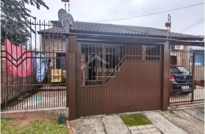 Casa com 2 quartos à venda na mario isaias pereira da silva, 569, pasqualini, sapucaia do sul por r$ 295.000