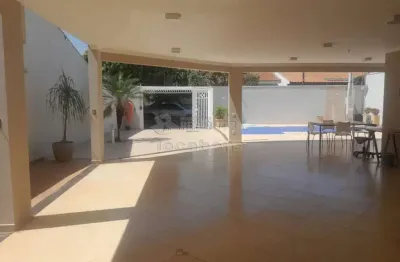 Casa residencial e comercial para venda com escritorio e piscina aquecida.