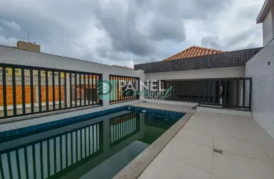 Casa Sobreposta Alta Duplex à Venda em Embaré, Santos – 4 suítes, piscina e espaço gourmet, frente