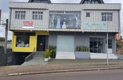 Prédio com 511,00m² de área construída   comercial e residencial no centro de araucária.
