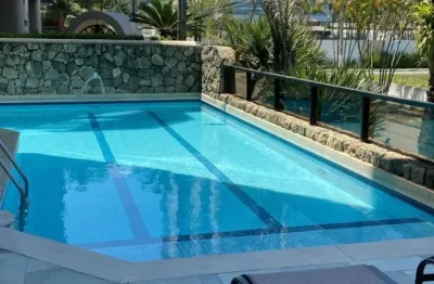 Lindo apartamento com 4 quartos sendo 2 suítes a poucos metros da praia na enseada.