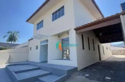 Casa com 4 dormitórios à venda, 278 m² por r$ 1.435.000,00 - jardim primavera - caraguatatuba/sp